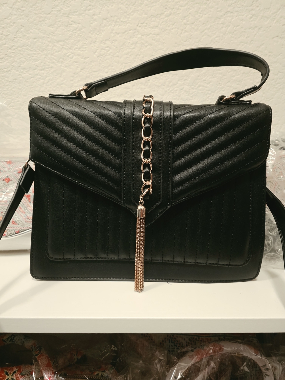 Black Quilted Top-Handle Shoulder Bag with Gold Chain Tassel
